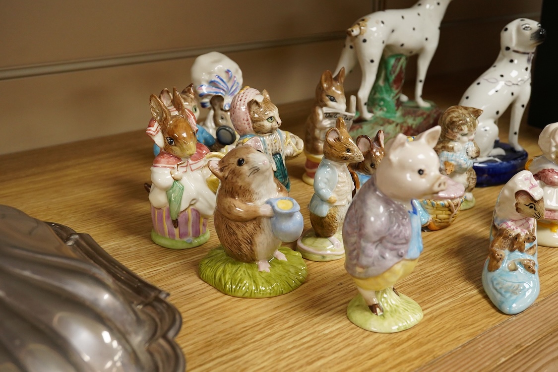 A collection of Beatrix Potter figures, three Staffordshire Dalmatians and a Copenhagen Dalmatian, tallest 16cm high